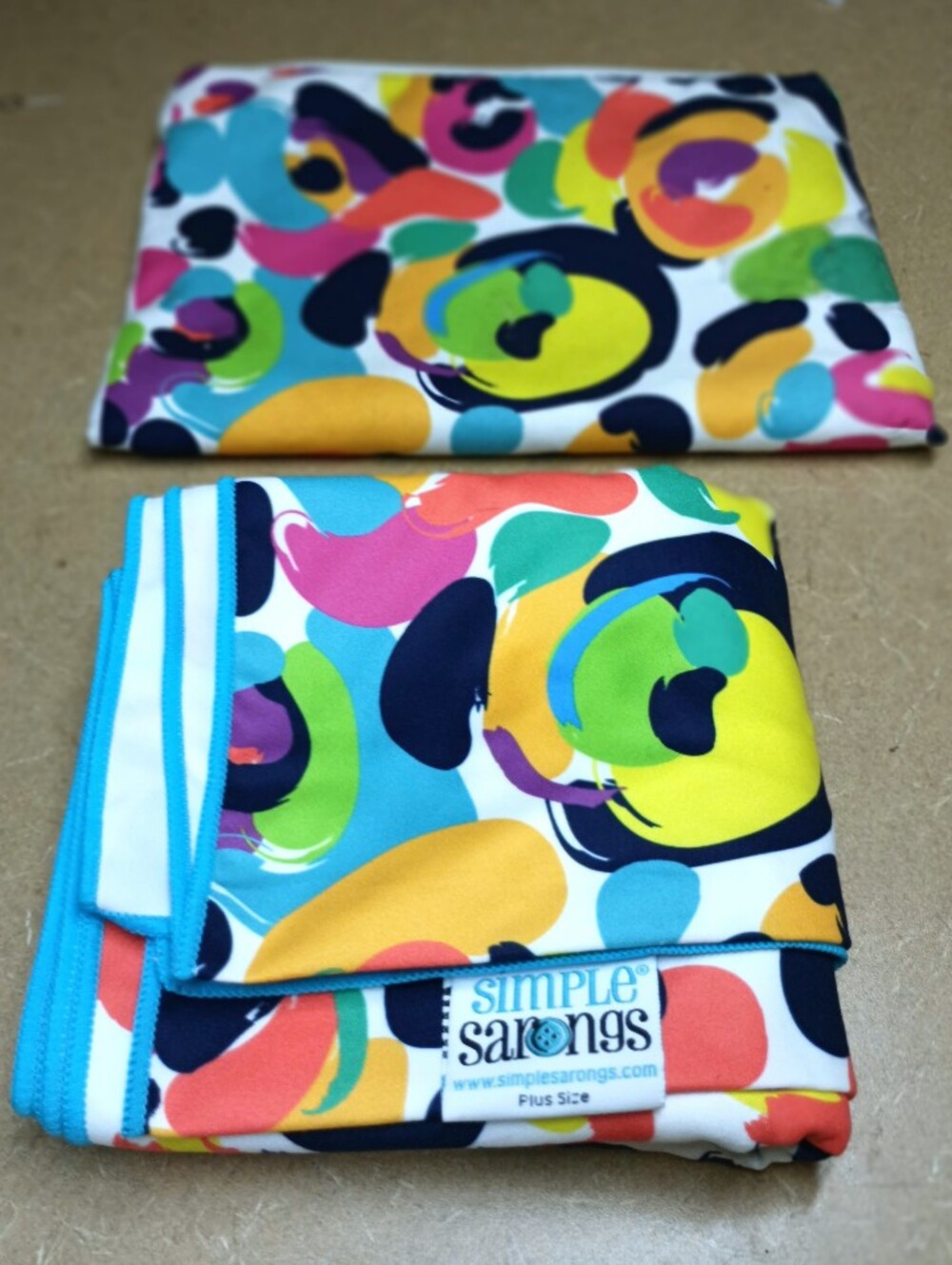 1 to 3x simply Sarong. NWT cute design comes in waterprooof zip up bag